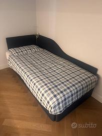 Letto  singolo con testata imbottita