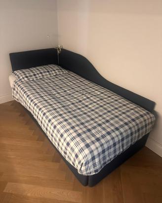 Letto  singolo con testata imbottita
