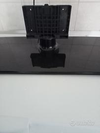 Base con piastra per TV.