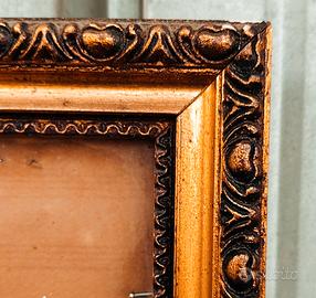Cornice per quadri antica, dorata 34x44.