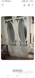 Abito da sposa tg. 44 (€ 40) e velo (€ 25)