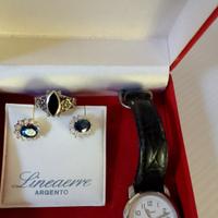 Parure anello e orecchini argento.