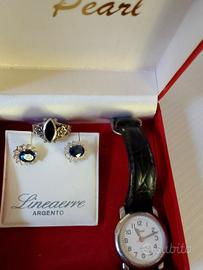 Parure anello e orecchini argento.