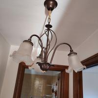 Lampadario in metallo e vetro