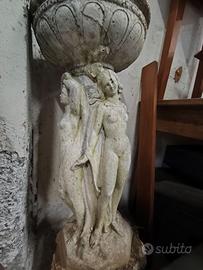 Statua e fontana di cemento
