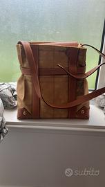 2Borse , 1lume 1 candeliere e 1 lampada con lente