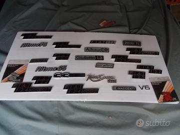 Etichette in metallo anni 50/70 per auto