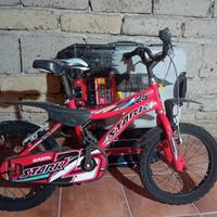 Bicicletta bimbo 5,6 anni più pattini nuovissimi