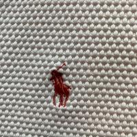 Polo bianca in tessuto piquet da uomo