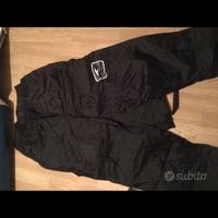 Pantaloni anti pioghia moto