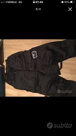 Pantaloni anti pioghia moto