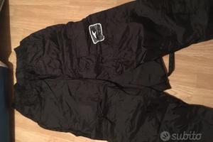 Pantaloni anti pioghia moto