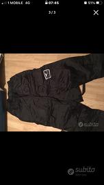 Pantaloni anti pioghia moto