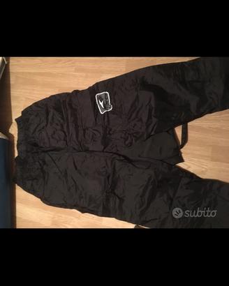 Pantaloni anti pioghia moto