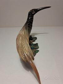 Uccello vintage in corno intagliato a mano