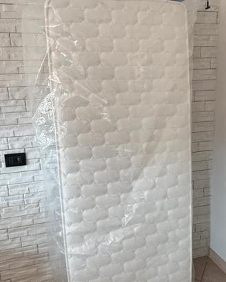 Materasso singolo reversibile  come nuovo
