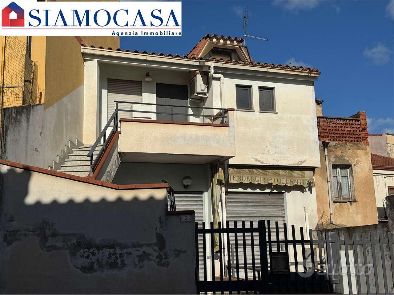 Casa con appartamento, locale commerciale e garage - Vista 2