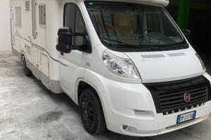 Semintegrale con porta moto