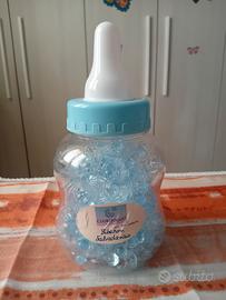 Salvadanaio biberon e 150 ciucci azzurro