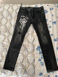 Jeans AMIRI neri con angioletto