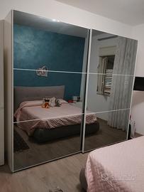 Armadio due ante scorrevoli con specchio 