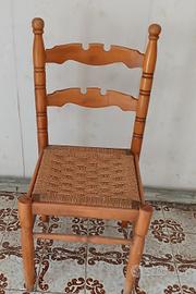 Sedia vintage con seduta intrecciata