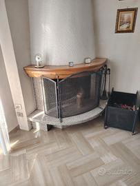 Camino angolare con marmo e mensola