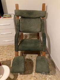 Poltrona a dondolo vintage firmata