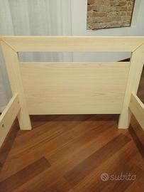 Letto singolo con testiera