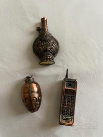 Assortimento accendini particolari in rame