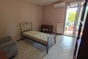Camera con bagno e terrazzo a Correggio