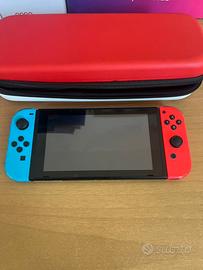 Nintendo switch + 2 giochi + custodia+dock station