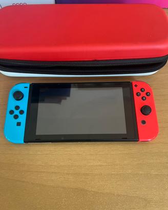 Nintendo switch + 2 giochi + custodia+dock station