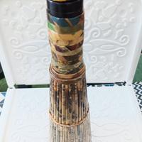 Bottiglia rivestita dì carta 