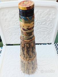 Bottiglia rivestita dì carta 