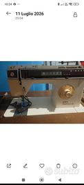 Macchina da cucire Singer con mobiletto