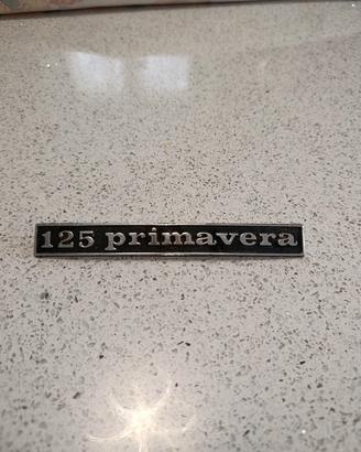vespa primavera, targa/logo