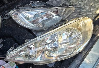 coppia fari anteriori doppia parabola peugeot 206