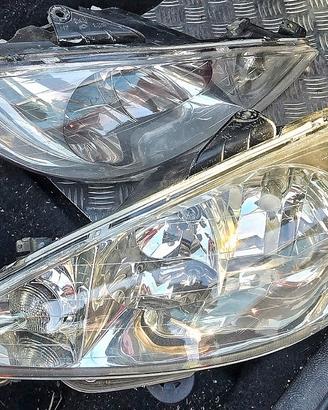 coppia fari anteriori doppia parabola peugeot 206