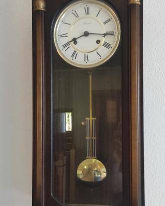 orologio a pendolo a muro