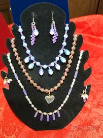 parure da ametista e perla.