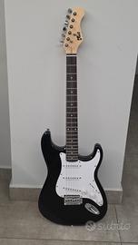 chitarra elettrica con amplificatore mai usata 