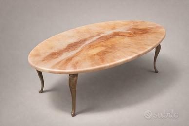 Tavolo ovale in marmo con gambe decorative 