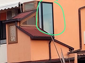 4 scorrevoli e due finestre fisse