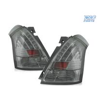 FANALI PER SUZUKI SWIFT 05-10 LED FONDO CROMATO FU
