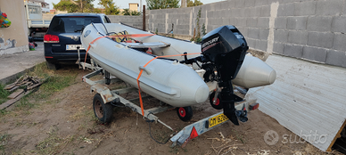 Gommone in VTR motore 20 CV nuovo e carrello omolo