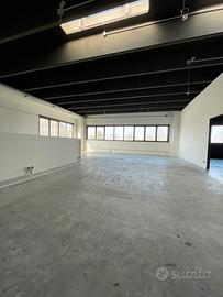 Capannone al primo piano a dosson