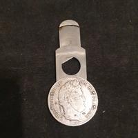 Moneta d'epoca in argento con tagliasigari interno