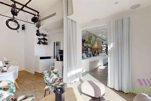 Mura di locale commerciale con forte passaggio