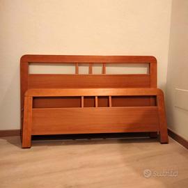 Letto una piazza e mezzo in legno con comodino